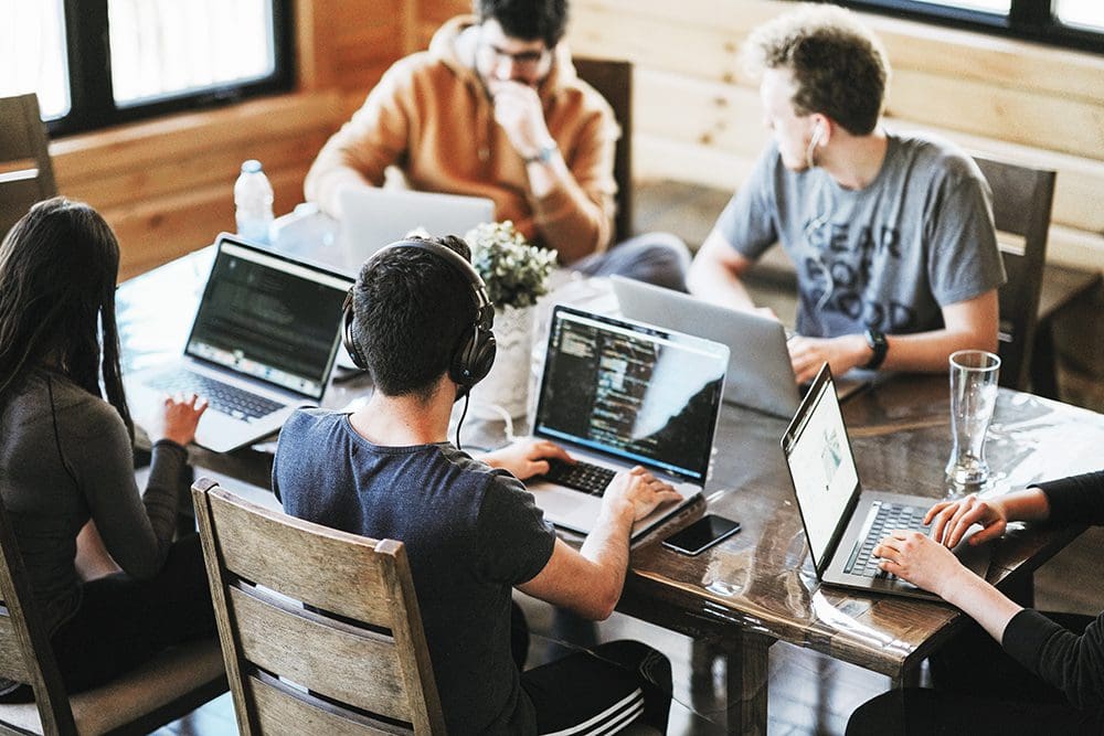 A team of people in an office working out their video marketing strategy