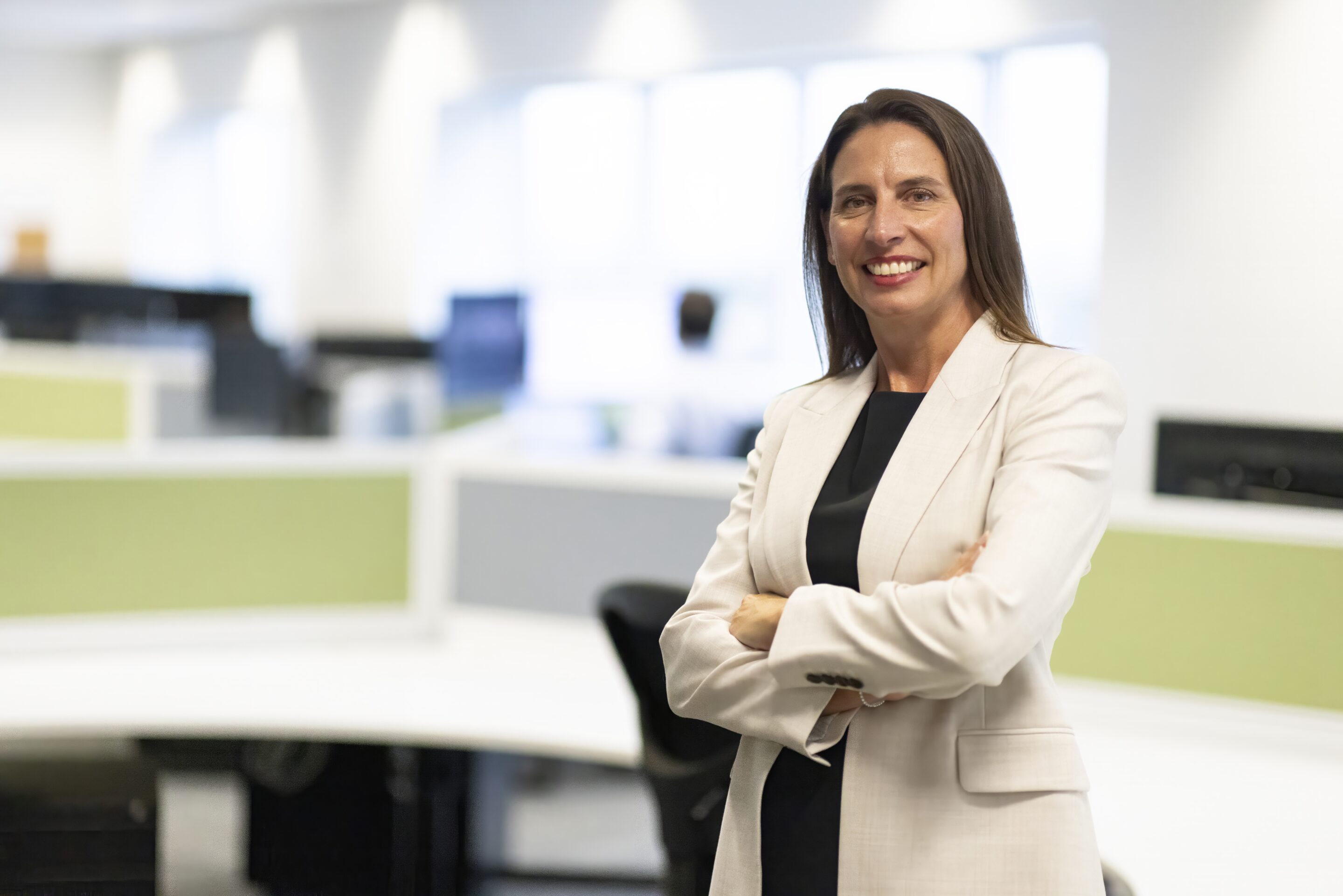 Lady standing in office Lady standing in office
