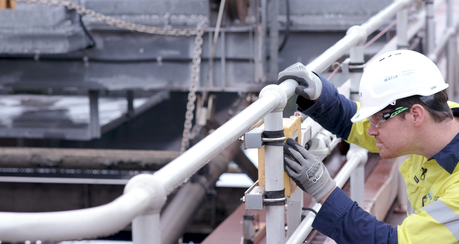 Water infrastructure worker making adjustments